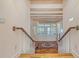 Inviting foyer featuring wood floors, decorative rug, and beamed ceilings, creating a warm entry at 5024 Commonwealth Dr, Sarasota, FL 34242