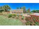 Community entrance with attractive signage and lush landscaping in the Meadows at 5122 Marsh Field Rd # 62, Sarasota, FL 34235