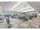 Well-equipped fitness center with modern exercise machines, ample natural light, and a sleek, contemporary design at 5388 Bartolomeo St, Sarasota, FL 34238