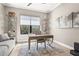 Cozy office space featuring a desk, comfortable seating, and stylish decor at 5388 Bartolomeo St, Sarasota, FL 34238
