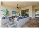 Relaxing outdoor living area with stylish furniture and views of the surrounding landscape at 5388 Bartolomeo St, Sarasota, FL 34238