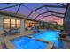 Spectacular pool and spa area with comfortable lounge chairs, ideal for relaxation and outdoor enjoyment at 5388 Bartolomeo St, Sarasota, FL 34238