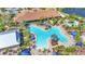 Resort-style pool with ample seating and lush landscaping, perfect for relaxation at 5388 Bartolomeo St, Sarasota, FL 34238