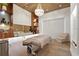 Spa treatment room featuring a massage table, recessed lighting, a sink and built in storage at 5388 Bartolomeo St, Sarasota, FL 34238