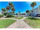 Beautiful pool area with stone picnic tables at 5631 Midnight Pass Rd # 1007, Sarasota, FL 34242