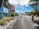 Wide angle view of the parking lot near the condominiums with a beach view at 565 Sutton Place, Longboat Key, FL 34228