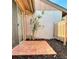 Enclosed brick-paved patio with lush plants is accessible through a sliding glass door at 5657 Westwind Ln, Sarasota, FL 34231