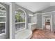 Bright bathroom with a garden tub under an arched window and tile flooring at 6620 Saint James Xing, University Park, FL 34201