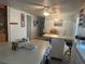 Open eat-in kitchen flowing into a dining area, complete with tile flooring at 6882 Holo Ct, North Port, FL 34287