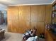 Spacious living room boasts a built-in wall cabinet at 6882 Holo Ct, North Port, FL 34287