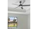 Light filled bedroom with ceiling fan and outdoor view to the pool at 7116 Quarry St, Englewood, FL 34224