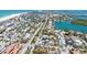 Scenic aerial view of homes along the water with easy access to boating, beaches, and other community ammenities at 723 S Blvd Of The Presidents, Sarasota, FL 34236