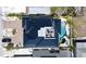 Beautiful home features a rooftop deck, pool with a slide, outdoor entertaining space, and luxurious details at 723 S Blvd Of The Presidents, Sarasota, FL 34236
