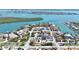 Expansive aerial view of the beautiful coastal community with water access and tropical landscaping at 723 S Blvd Of The Presidents, Sarasota, FL 34236
