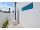 Outdoor shower is conveniently located near the yard, featuring a modern design and privacy fence at 723 S Blvd Of The Presidents, Sarasota, FL 34236