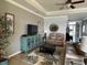 Cozy living room with stylish furniture, decorative accents, and ample natural light, creating a welcoming space at 7360 Talon Bay Dr, North Port, FL 34287
