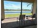 Scenic patio overlooking a serene lake, ideal for enjoying peaceful views at 7360 Talon Bay Dr, North Port, FL 34287