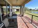 Inviting brick patio with comfortable seating, perfect for outdoor relaxation at 7360 Talon Bay Dr, North Port, FL 34287