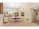 The formal dining room has an elegant chandelier and room for up to six guests at 7639 Fairway Woods Dr # 605, Sarasota, FL 34238