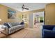 Inviting living room with large windows and cozy seating, with views of an adjacent lanai at 7639 Fairway Woods Dr # 605, Sarasota, FL 34238