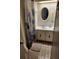 Bathroom with white cabinets, single sink, a mirror and tiled floors at 808 53Rd E Ave # 229, Bradenton, FL 34203