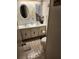 Bathroom featuring double sinks, white cabinets and tiled floors at 808 53Rd E Ave # 229, Bradenton, FL 34203