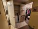 A combined laundry room and closet area with a washer, dryer, and storage space at 808 53Rd E Ave # 229, Bradenton, FL 34203