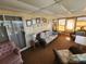 Comfortable living area with wicker furniture, natural light and framed wall décor at 808 53Rd E Ave # 229, Bradenton, FL 34203