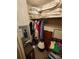 An overloaded storage room with clothing, boxes, an electrical panel, and a lamp at 808 53Rd E Ave # 229, Bradenton, FL 34203