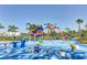 Colorful splashpad featuring sprinklers, waterfalls, and an overhead spider water feature at 9725 Last Light Gln, Parrish, FL 34219