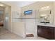 Elegant bathroom showcasing a glass-enclosed shower and a sleek, modern vanity at 10816 O Meara Way, Englewood, FL 34223