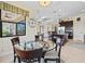 Open layout displays the kitchen, dining area, and living room perfect for entertaining at 10816 O Meara Way, Englewood, FL 34223