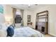 Bedroom with queen size bed, neutral walls, light colored carpet, and a view from the window at 1358 Cielo Ct, North Venice, FL 34275