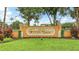 Beautifully landscaped 'Willow Chase' community entrance sign with mature trees at 1358 Cielo Ct, North Venice, FL 34275
