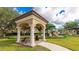 Picturesque gazebo near playground offers a shaded area for relaxation and community gatherings at 1358 Cielo Ct, North Venice, FL 34275