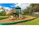 A vibrant playground with slides, climbing structures, and a soft landing surface at 1358 Cielo Ct, North Venice, FL 34275