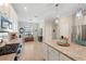 Bright kitchen with white cabinetry, stainless steel appliances, and tile flooring at 14309 Carolina Sky Pl, Lakewood Ranch, FL 34211