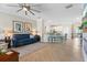 Inviting living room with comfortable seating and an open layout to the dining and kitchen areas at 14309 Carolina Sky Pl, Lakewood Ranch, FL 34211