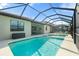 Enjoy this beautiful pool, lanai, and outdoor seating area at 14309 Carolina Sky Pl, Lakewood Ranch, FL 34211
