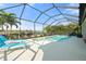 Relax and unwind in this home's inviting, screened-in pool with views at 14309 Carolina Sky Pl, Lakewood Ranch, FL 34211