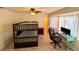 Bedroom with bunk beds, hardwood flooring and a workspace at 1438 Vermouth Ln, Punta Gorda, FL 33983