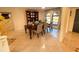 Formal dining room featuring a table with seating, neutral paint and tiled floor at 1438 Vermouth Ln, Punta Gorda, FL 33983