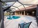Well-maintained in-ground pool within a screened enclosure and an ample entertaining area at 1438 Vermouth Ln, Punta Gorda, FL 33983