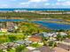 Aerial view of a community with beautiful lakes and wetlands on waterfront property at 1717 Bonita Bluff Ct, Ruskin, FL 33570