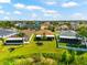 Aerial view of home with lush lawn featuring with pond, wetland and lake views at 1717 Bonita Bluff Ct, Ruskin, FL 33570