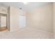Neutral bedroom featuring a closet, neutral carpet and paint, and a doorway at 1717 Bonita Bluff Ct, Ruskin, FL 33570