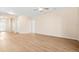 Expansive living room with hardwood floors and natural light, offering versatility and comfort at 1717 Bonita Bluff Ct, Ruskin, FL 33570