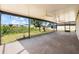 Covered patio featuring ceiling fans and string lights at 1717 Bonita Bluff Ct, Ruskin, FL 33570
