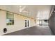 Covered patio featuring ceiling fans and string lights at 1717 Bonita Bluff Ct, Ruskin, FL 33570