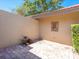 Enclosed patio with stone pavers, a bit of tropical greenery and lots of sunshine at 1720 Kestral Park S Way # 49, Sarasota, FL 34231